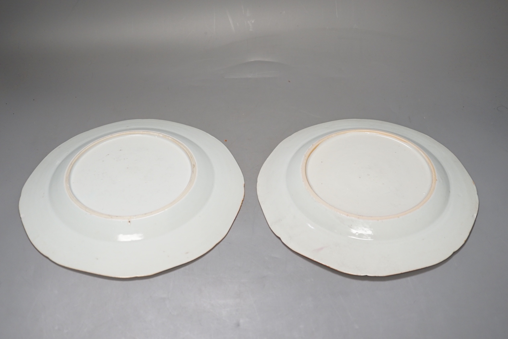 A group of 18th century chinese export: two plates, two sauceboats, a bowl and a tea bowl